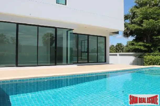 Modern style house with private swimming pool only a few steps to the beach. 3