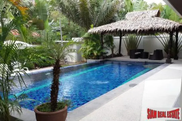 Modern four-bedroom private pool villa with jacuzzi and located near the beach 2