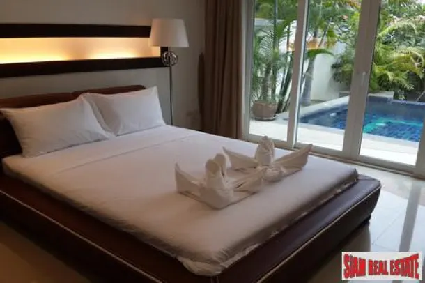Modern four-bedroom private pool villa with jacuzzi and located near the beach 3