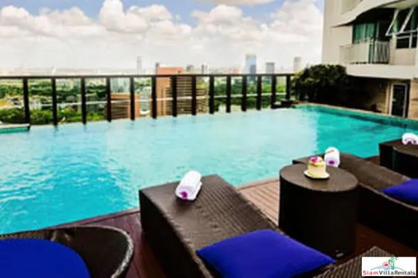 Convenient and Comfortable Two Bedroom Condo for Rent with Lots of Wood Accents in Lumphini 3